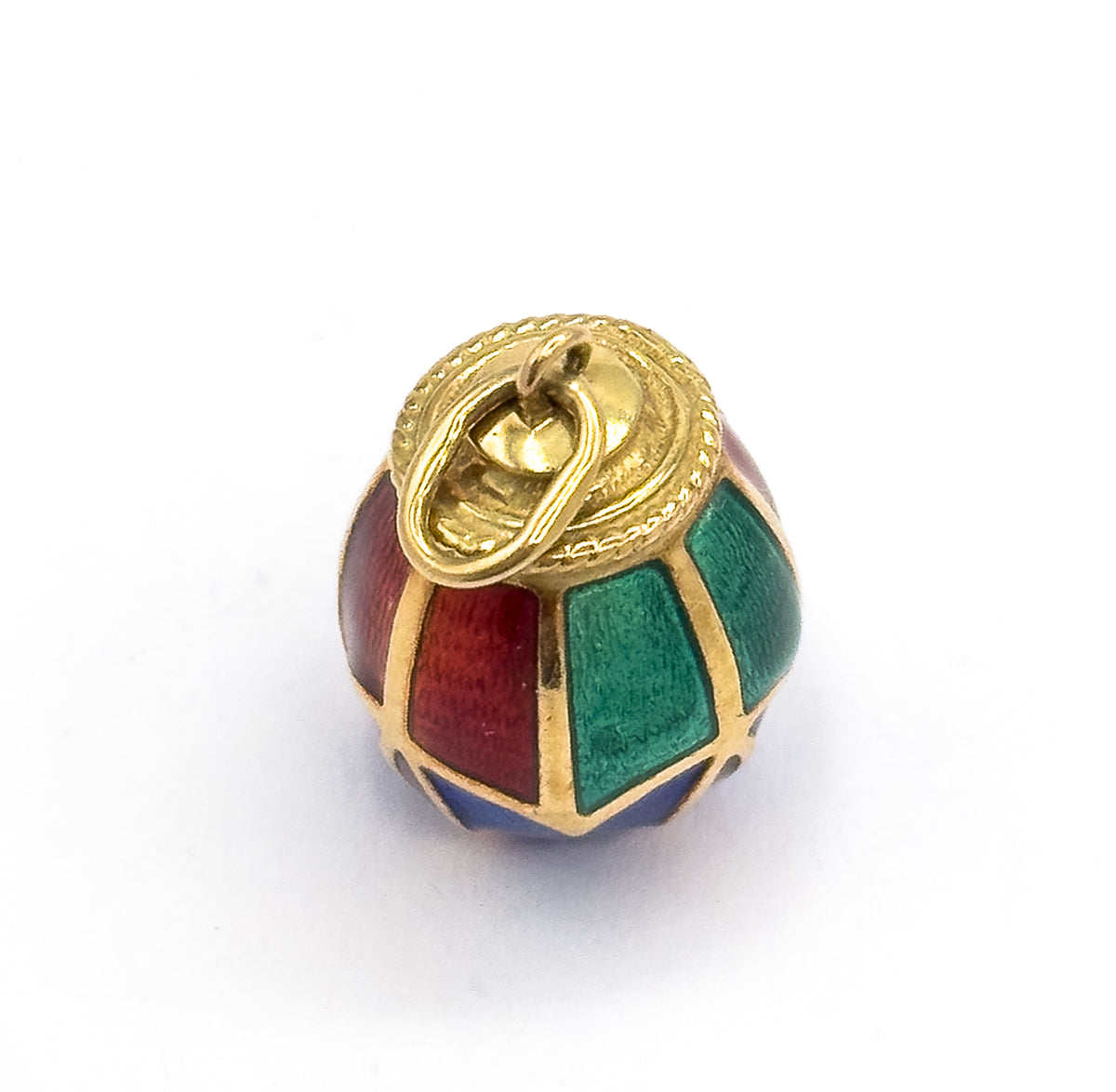 Viewed from above onto the rope-edged collar and looped bail, with red, green and a glimpse of blue panels fanning away beneath in their gold framework.