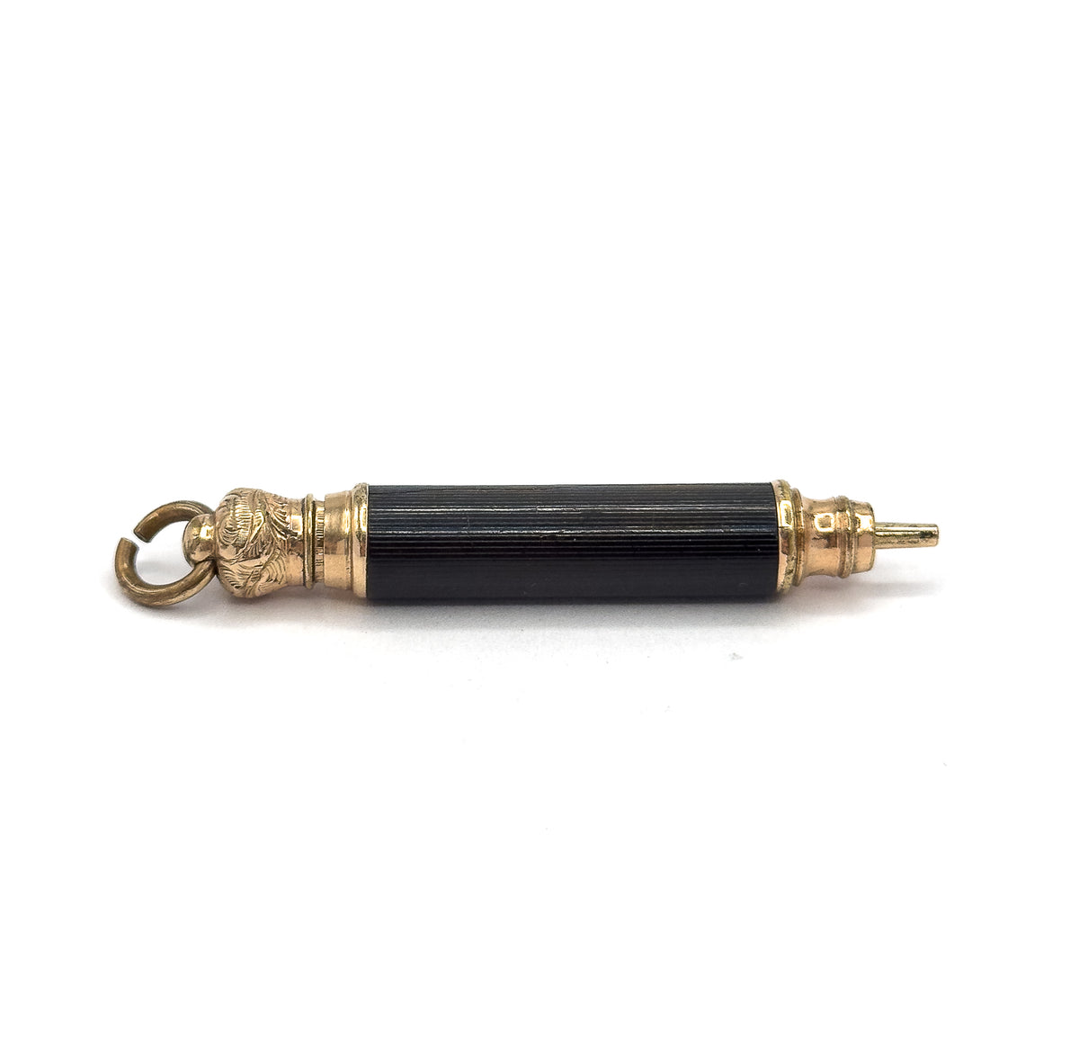 The pendant shown horizontally against white, the full length in profile from the open suspension ring at left to the slim gold tone tip protruding at right.