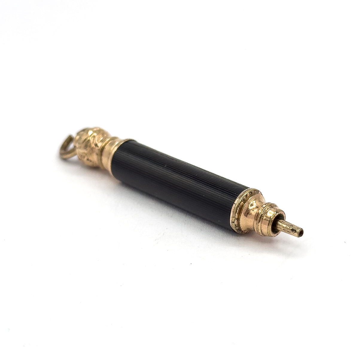 Overhead diagonal view in which the fine lengthwise fluting of the black barrel catches the light along its whole length, with the small suspension ring seen flat at upper left.