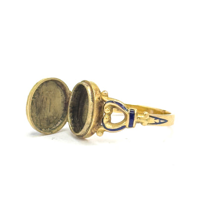 Almost the same view with slightly different angle, lower and from the other side, so the heart-shaped openwork shoulder with its blue enamel band and the tapering shank read clearly.