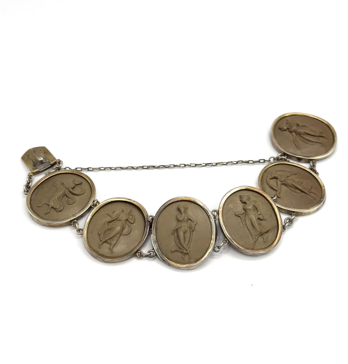 The whole bracelet face-up in a shallow arc, all six carved khaki-brown cameos of draped figures visible at once in their linked bezels, safety chain stretched across above.