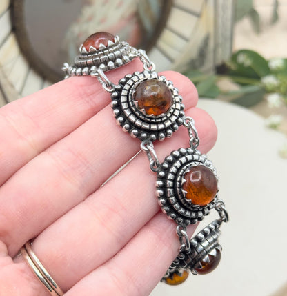 Vintage Orange Amber cabochon bracelet in 835 Silver textured vintage bracelet