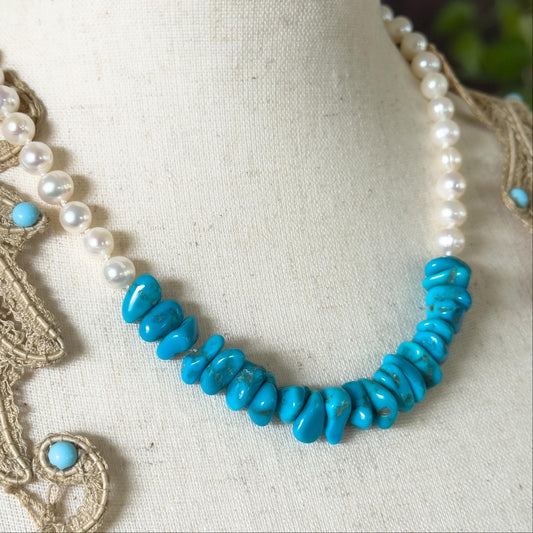 Necklace with turquoise beads and pearls on a mannequin