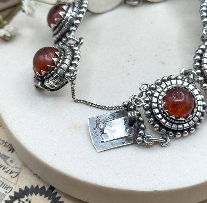 Vintage Orange Amber cabochon bracelet in 835 Silver textured vintage bracelet