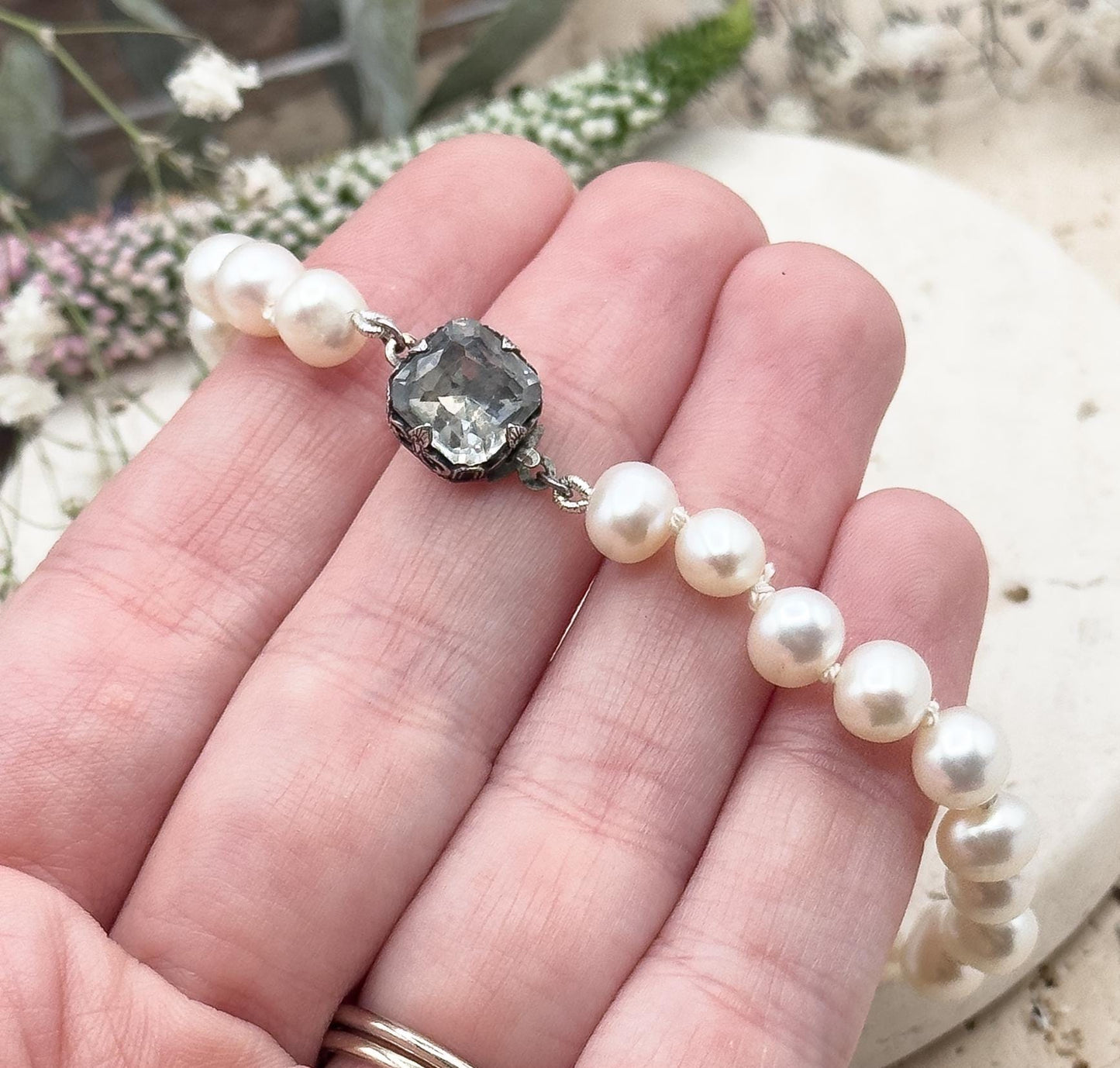 Beautiful Cultured Pearl Bracelet with Antique Paste clasp in sterling hand knotted pearls