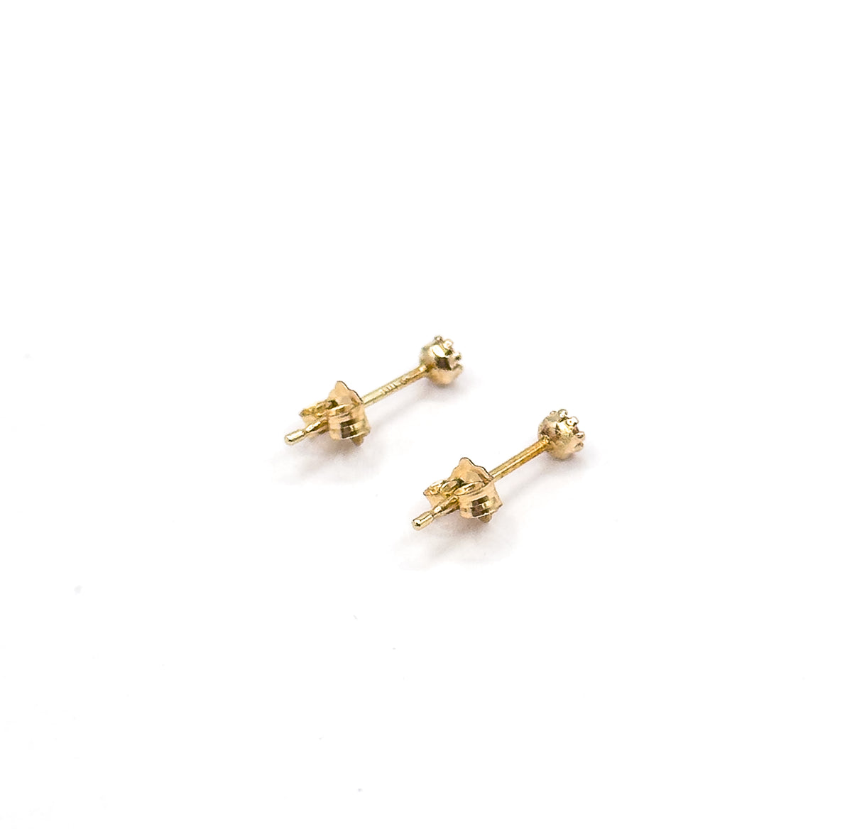 A pair of pink glass stud earrings in 14K yellow gold, shown side by side on a white background from behind, posts and butterfly backs facing the viewer.
