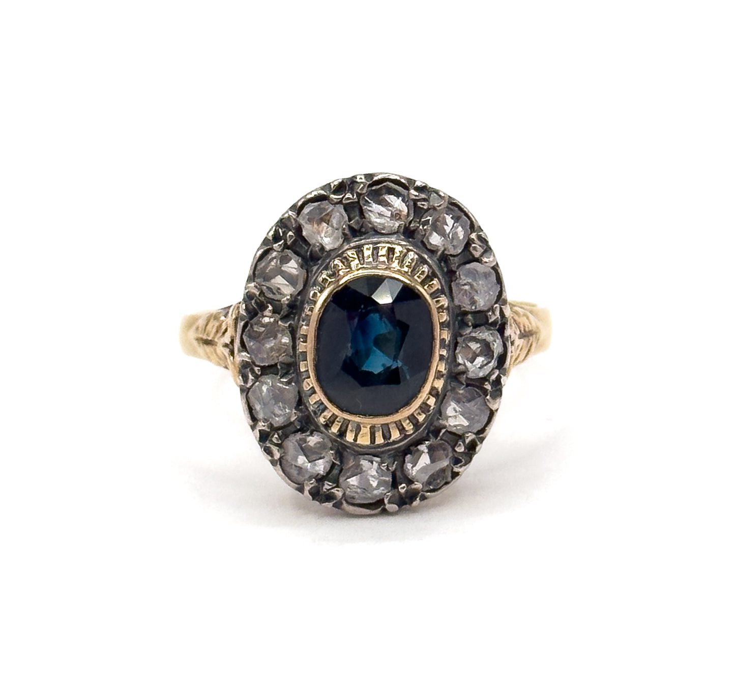 Antique Sapphire & Diamond Halo Ring in 18K Gold