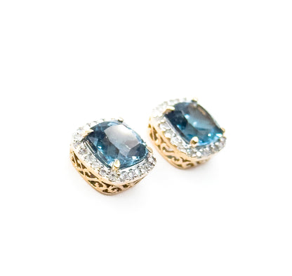 Contemporary Blue Topaz & Diamond Halo Stud Earrings in 14K Gold