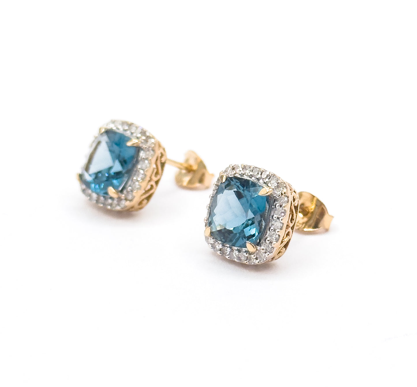 Contemporary Blue Topaz & Diamond Halo Stud Earrings in 14K Gold