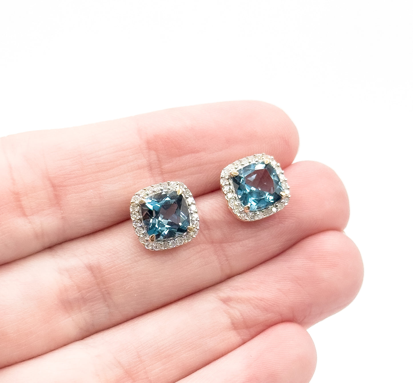 Contemporary Blue Topaz & Diamond Halo Stud Earrings in 14K Gold