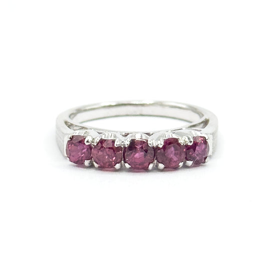 Vintage ruby five stone band in 14K white gold, shown upright from the front on a white background, the five round rubies in a row of basket settings above a plain satin-finish shank.