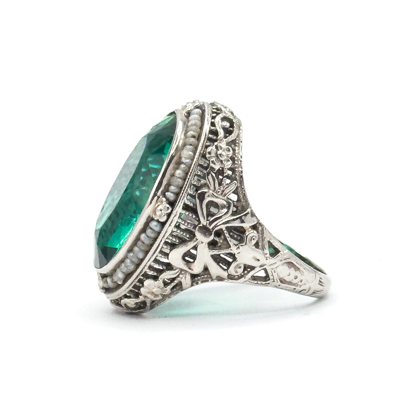 Art Deco Green Glass Paste Ring with Pearl Halo & Bow Filigree Details in White Gold