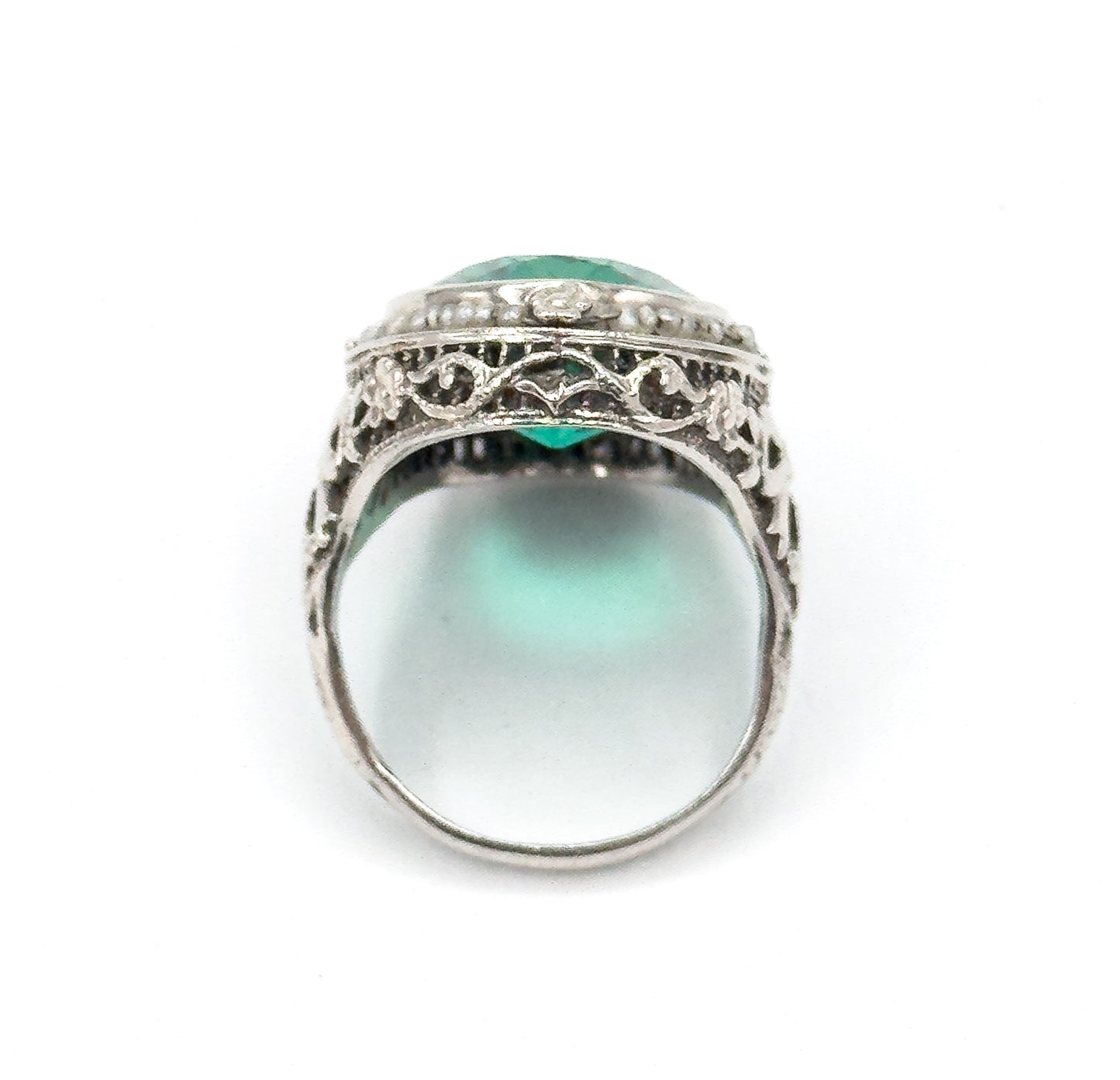 Art Deco Green Glass Paste Ring with Pearl Halo & Bow Filigree Details in White Gold
