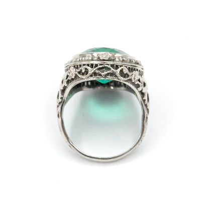Art Deco Green Glass Paste Ring with Pearl Halo & Bow Filigree Details in White Gold