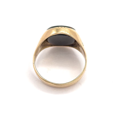 Viewed from behind and below, the open shank forms a circle with the back of the bezel and the underside of the oval bloodstone visible at the top.