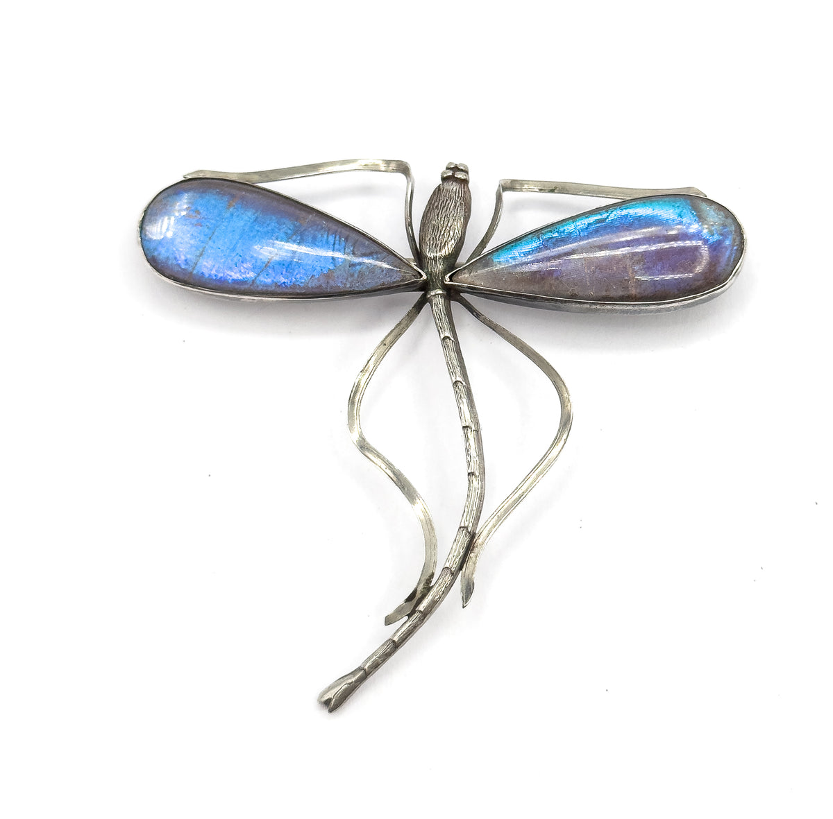 Upright from directly above with the beaded head at the top, a domed teardrop wing to each side in blue and violet, and the open wire frames curving down around the long segmented tail.