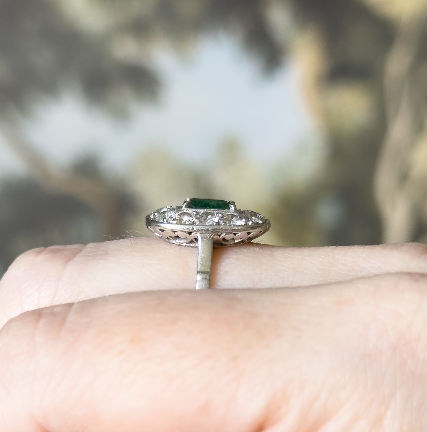 Art Deco Emerald & Diamond Halo Ring in Platinum
