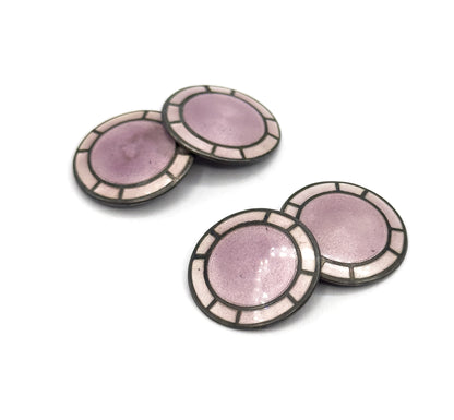 Both pairs face up on white, each disc showing a lavender guilloche centre ringed by pale enamel panels divided by silver spokes, the two pairs set diagonally apart.