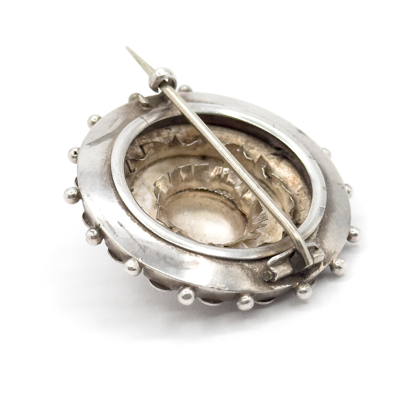 Victorian Aesthetic Period Brooch with Star Details in Silver