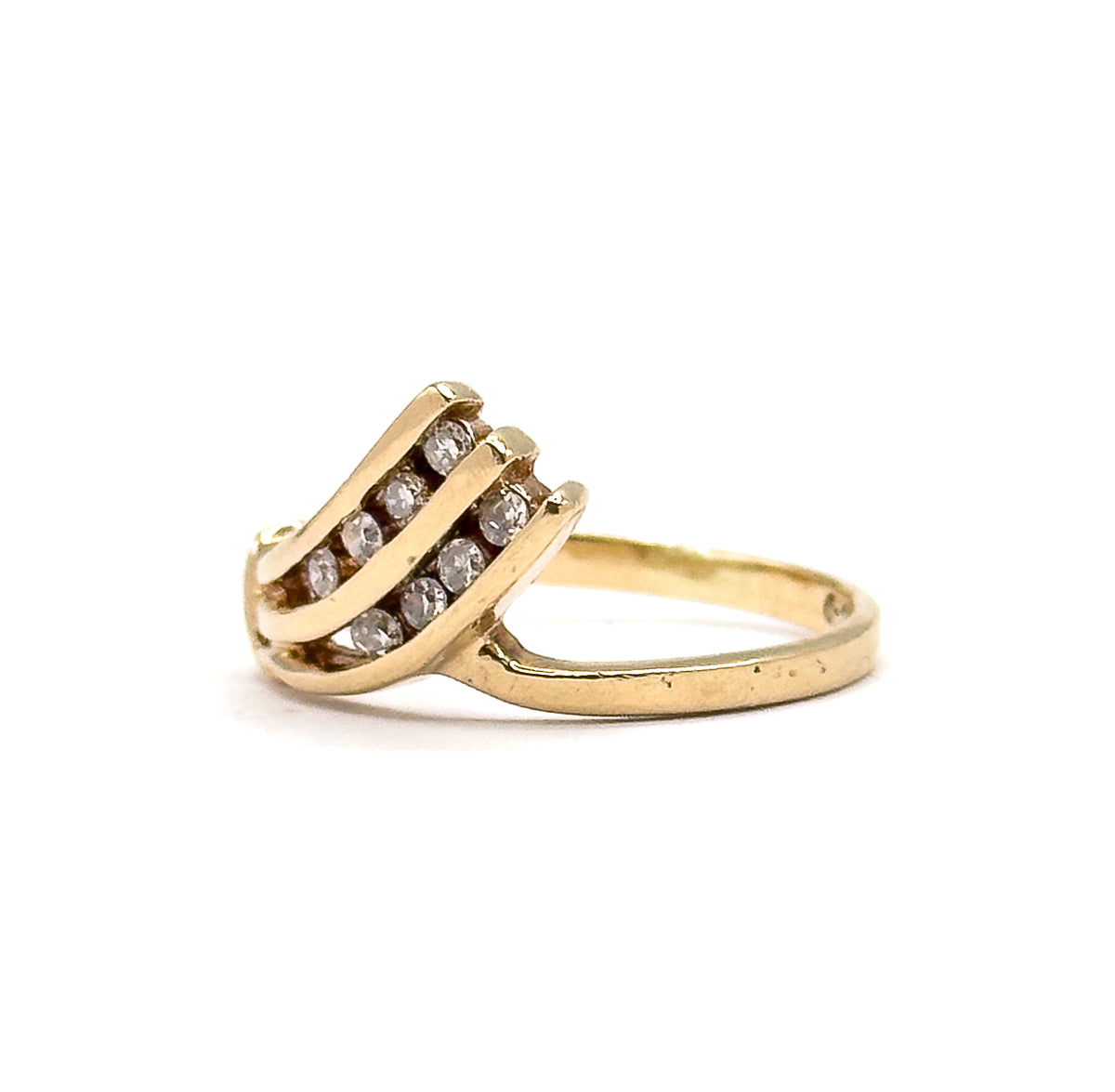 Almost the same view with slightly different angle, the face turned a little further so the stepped ends of the three diamond-set bars and the low profile against the shank come forward.