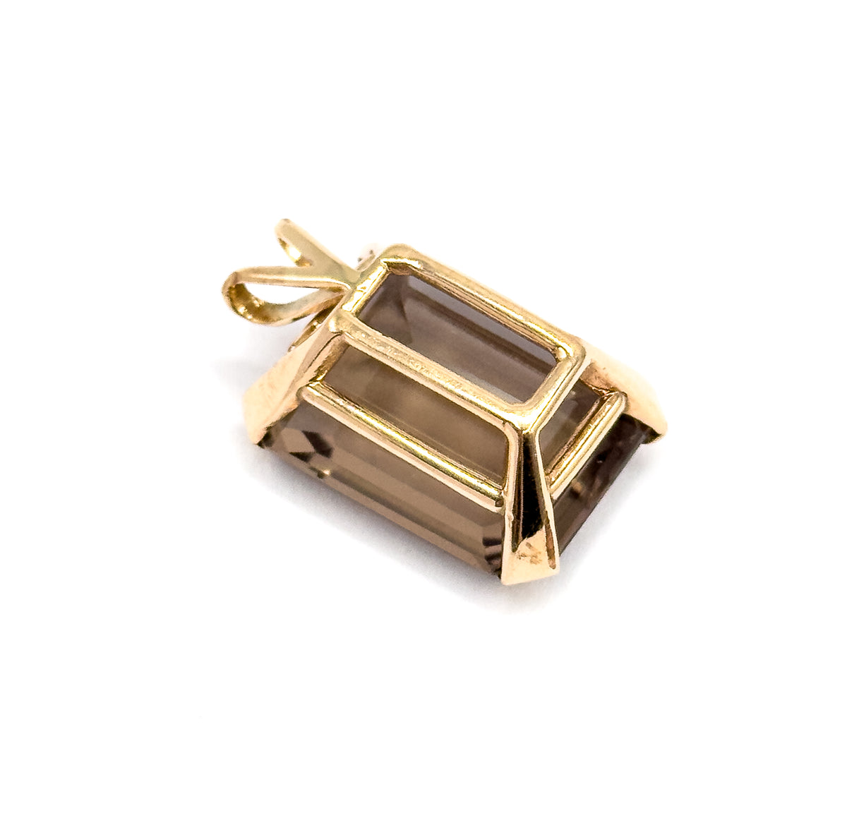 Angled from above against a white background, showing the stone's stepped depth, the broad yellow gold prongs running down each corner, and the bail tucked behind.