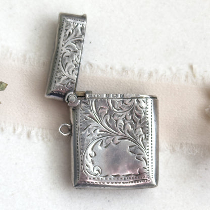 Antique vesta case in silver with floral details