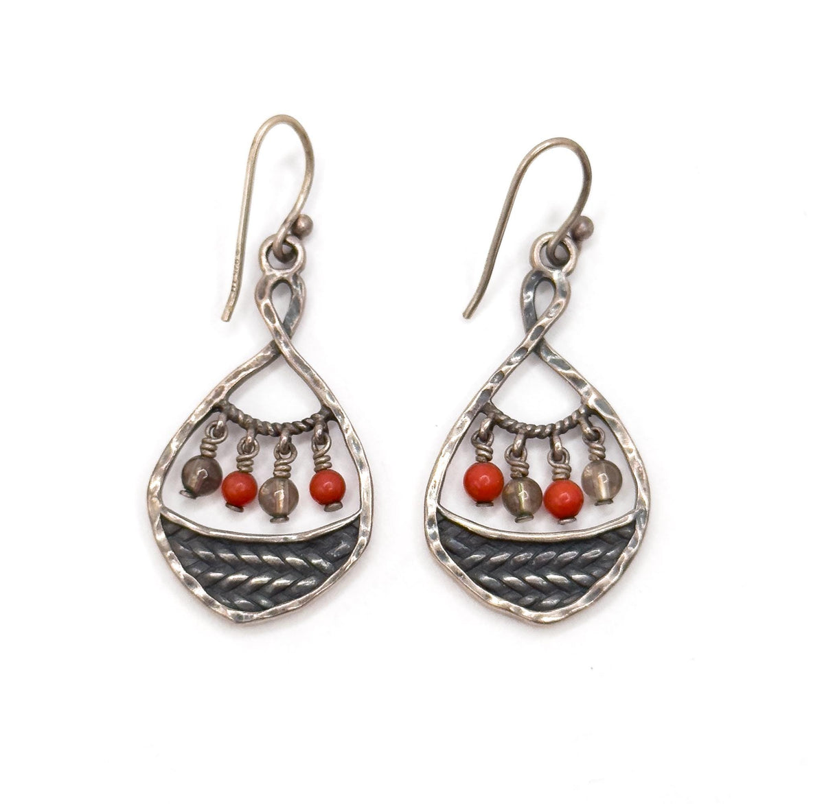 Both earrings straight on against white, full length from the curved ear wire hooks down to the pointed teardrop tips, with four small beads — two red, two clear — alternating on the rope-twist bar of each.